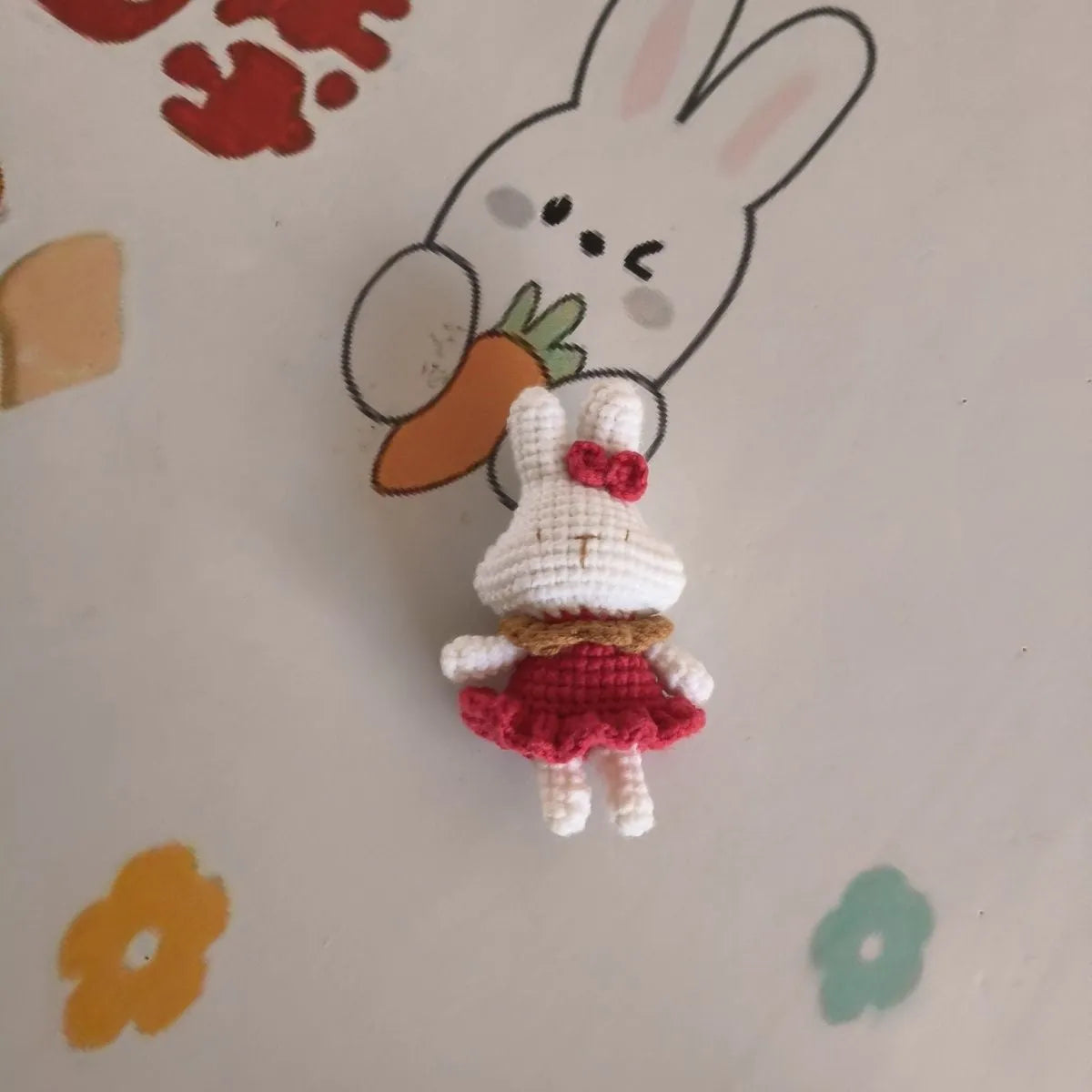 Hand-crocheted wool rabbit key chain with animal pendant design