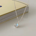 Silver geometric stone pendant on an adjustable curb chain necklace for women.