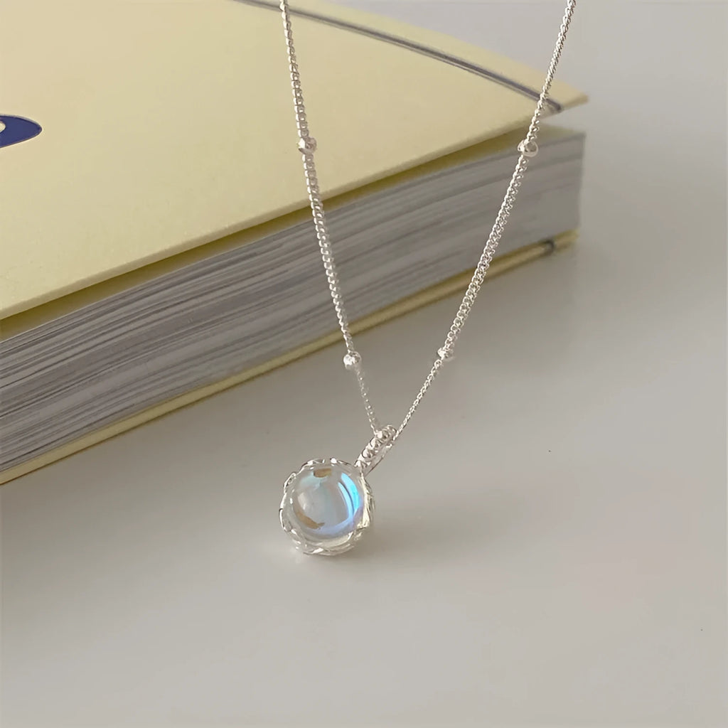 Women's geometric ornamental stone necklace with 925 silver curb chain in polished silver colour.
