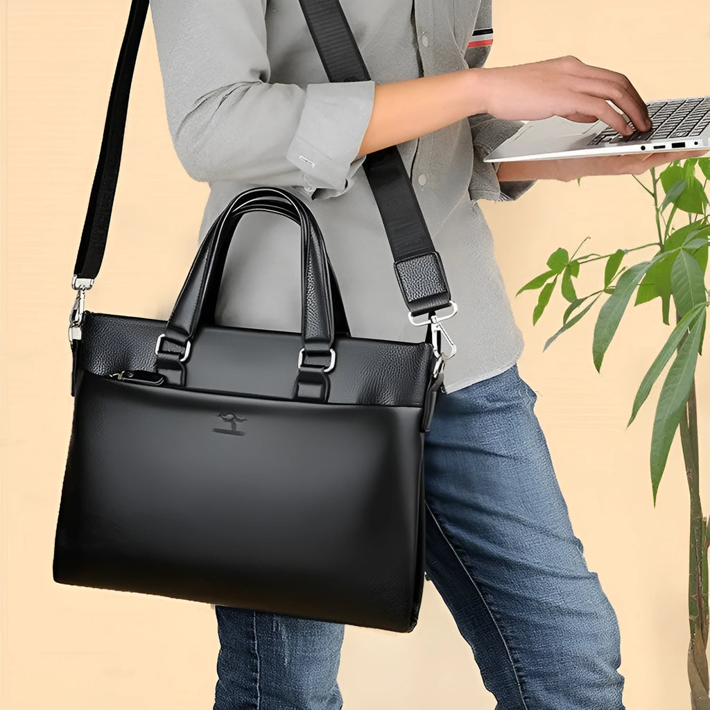 Men's black PU leather shoulder messenger bag with a splicing design detail.