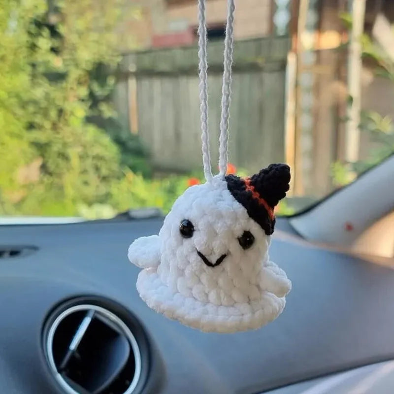 Plush hand-woven car hanging ornament in a cartoon design, made from soft polyester fabric.