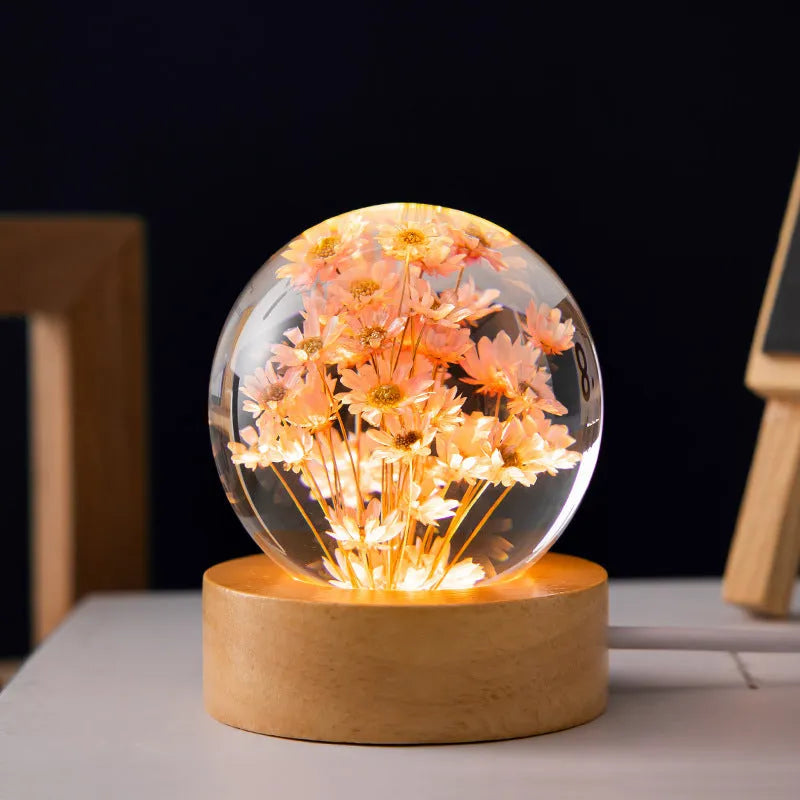3D dandelion eternal flower inside a luminous resin crystal ball on a beech wood stand base.