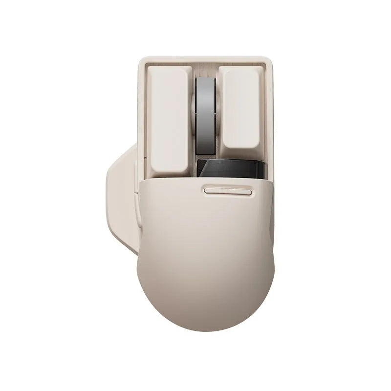 Xiaoqiao Tofu coloured three-mode wireless mouse with ergonomic shape on a desk.