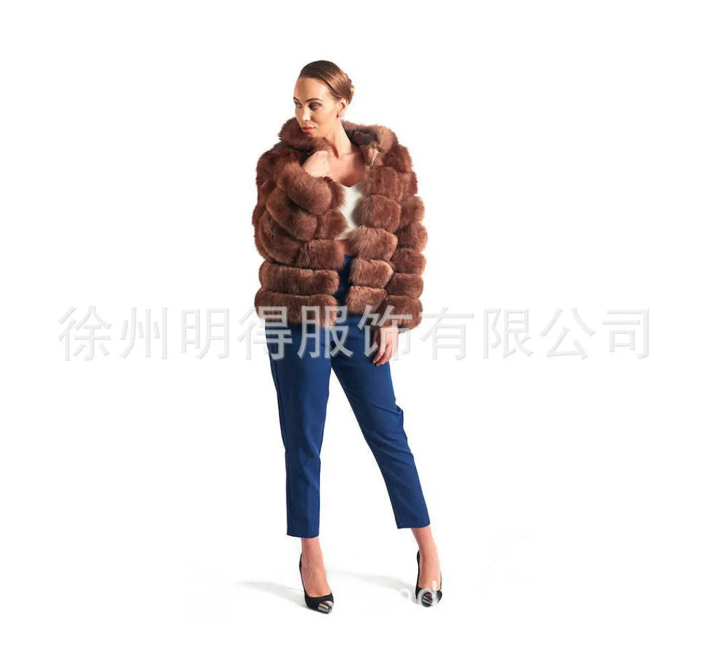 Women's loose brown faux fur hooded coat on a model, street fashion style.