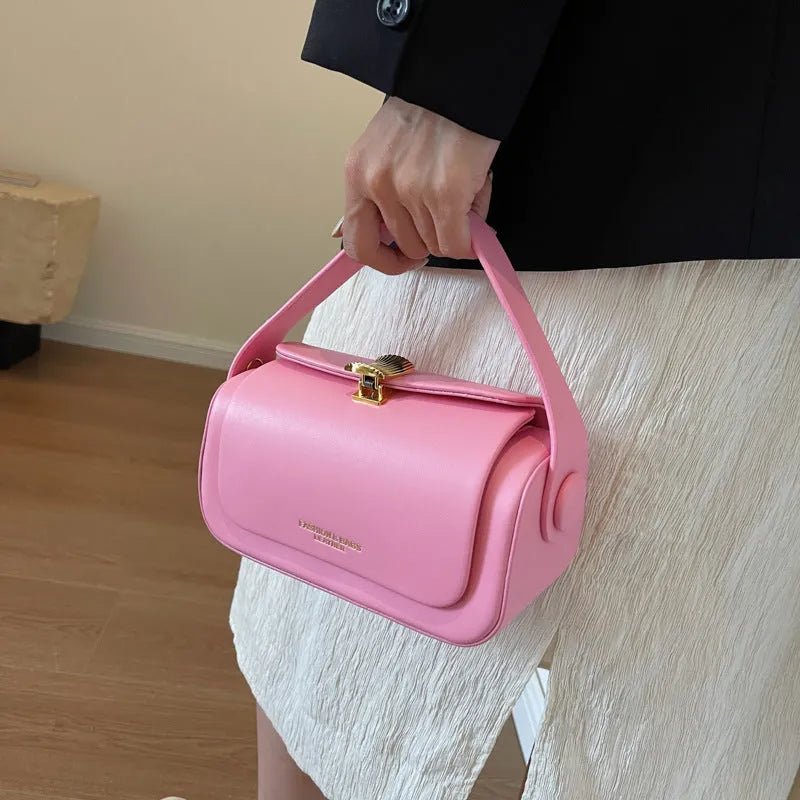Women's personalised shoulder messenger bag in beige with a monogram letter and adjustable strap.