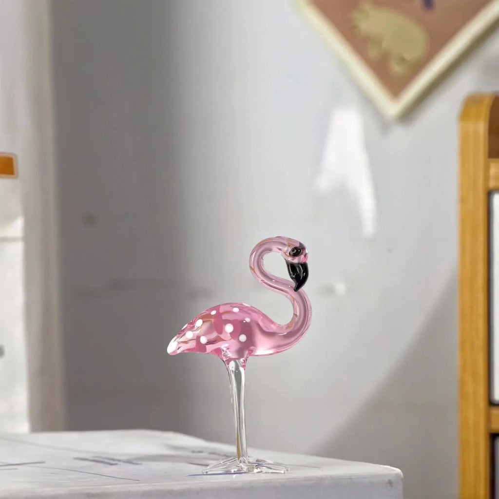 Pink flamingo crystal decorative figurine on a white base for modern home table decor.