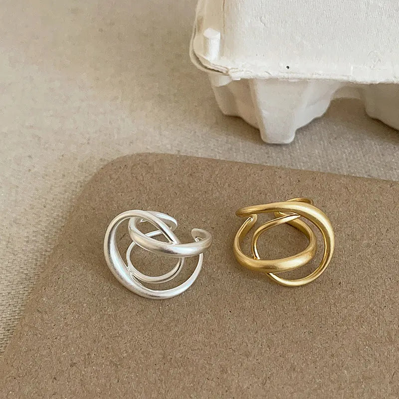 Three-dimensional interlaced geometric open ring in matte gold or silver electroplated finish