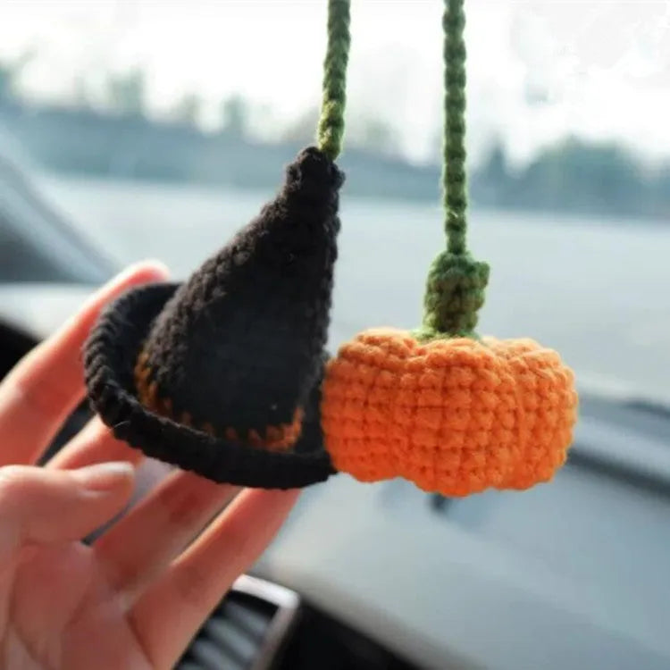 Plush hand-woven car hanging ornament in a cartoon design, made from soft polyester fabric.