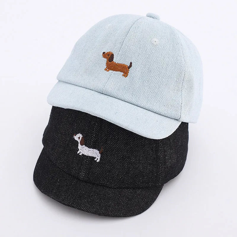 Babies denim puppy baseball cap with short brim and dome crown in light blue, dark blue, or black, 48cm size