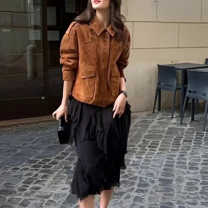 Women's brown suede-style street chic coat with regular sleeves on a hanger.