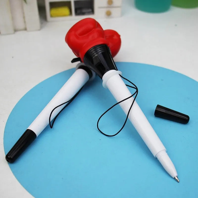 Four boxing press ejection pens with black ink and 0.7mm bullet tips