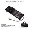 Black three-head split camping stove on outdoor table with burners visible