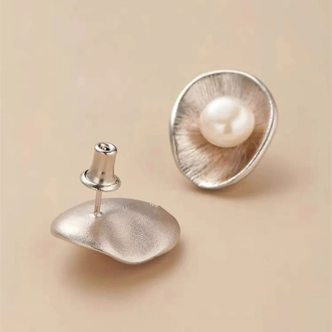 Gold geometric earrings with freshwater pearls on sterling silver posts and butterfly clasps