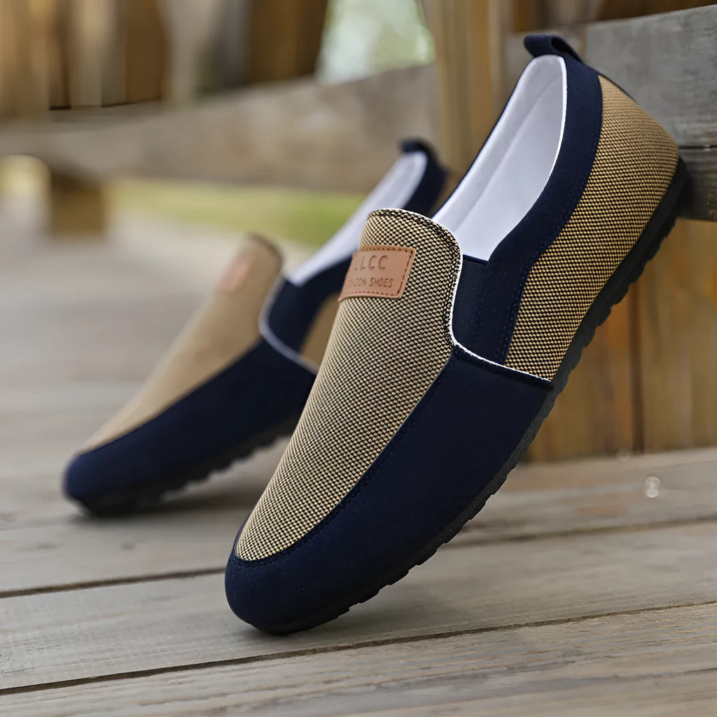 Men's grey and khaki canvas casual board shoes with round toe and rubber sole.