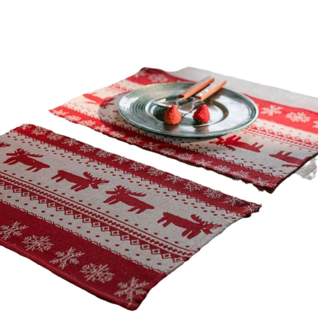 Home Christmas jacquard table runner in polyester cotton with jacquard red deer flat hem design on a table setting
