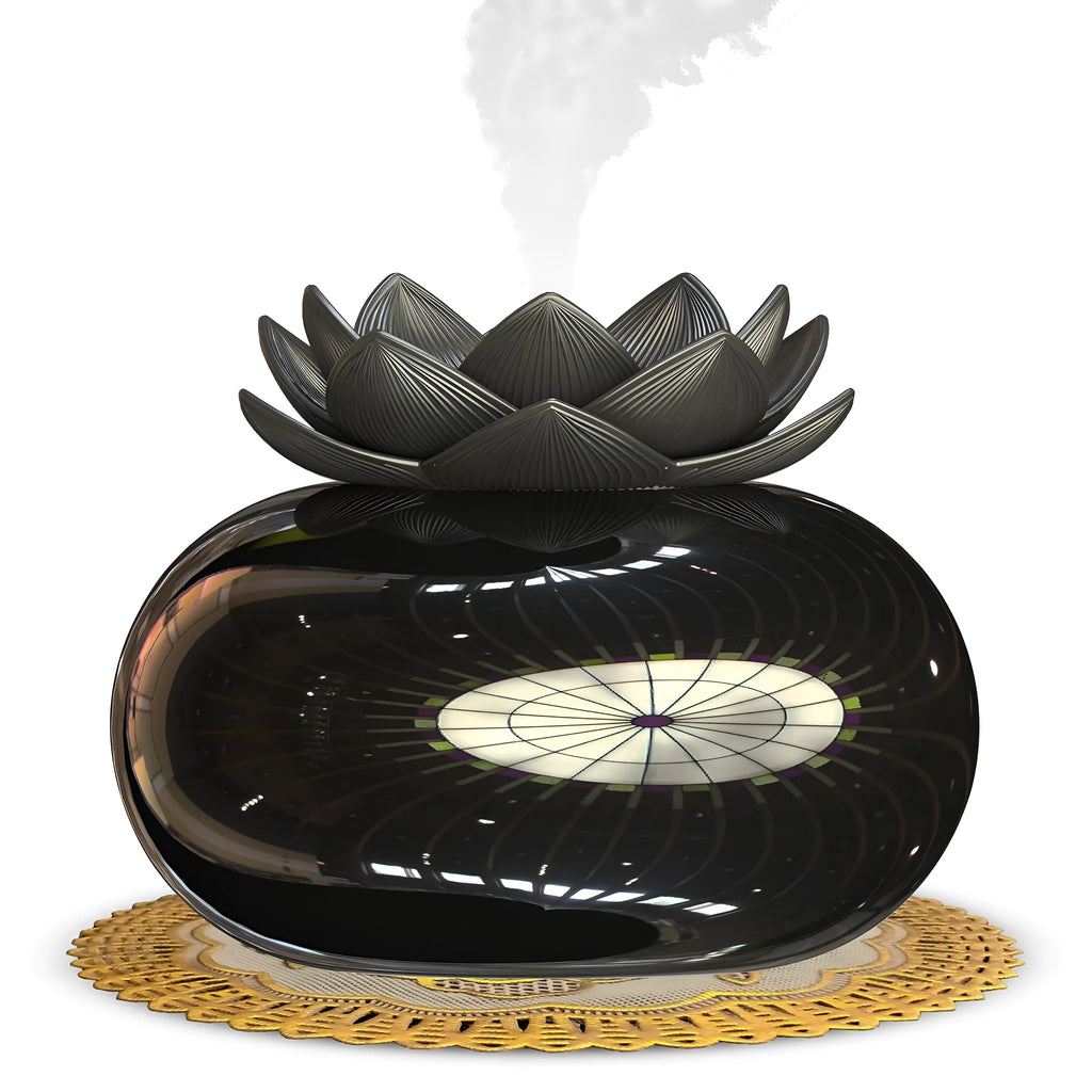 Pure black round Lotus aromatherapy ultrasonic humidifier with USB cable on a desk.