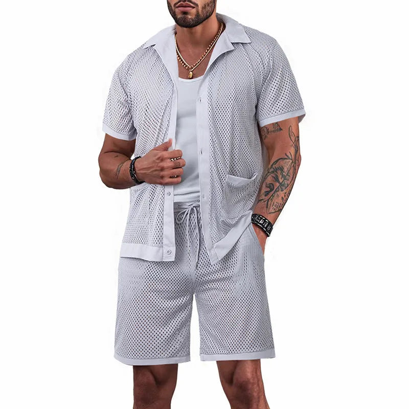 Beach Hawaii short sleeve dress and matching shorts set in light grey, laid flat.