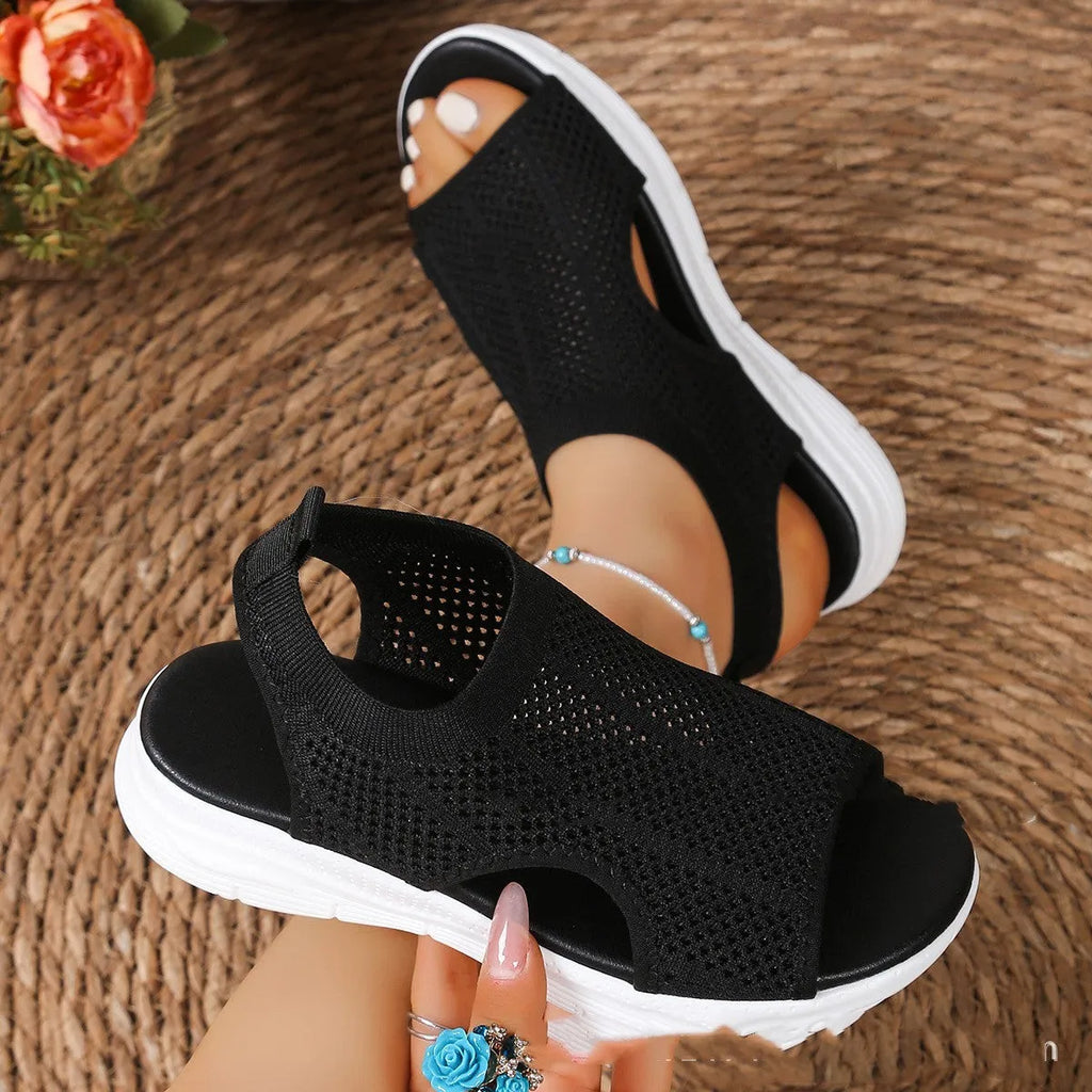 Women's black platform sports sandals with flat toe and rubber sole