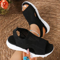 Women's black platform sports sandals with flat toe and rubber sole