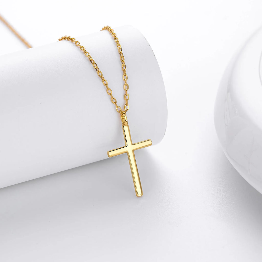 S925 sterling silver necklace with a simple glossy cross pendant on an O-shaped chain in a choice of gold, platinum, or rose gold plating.