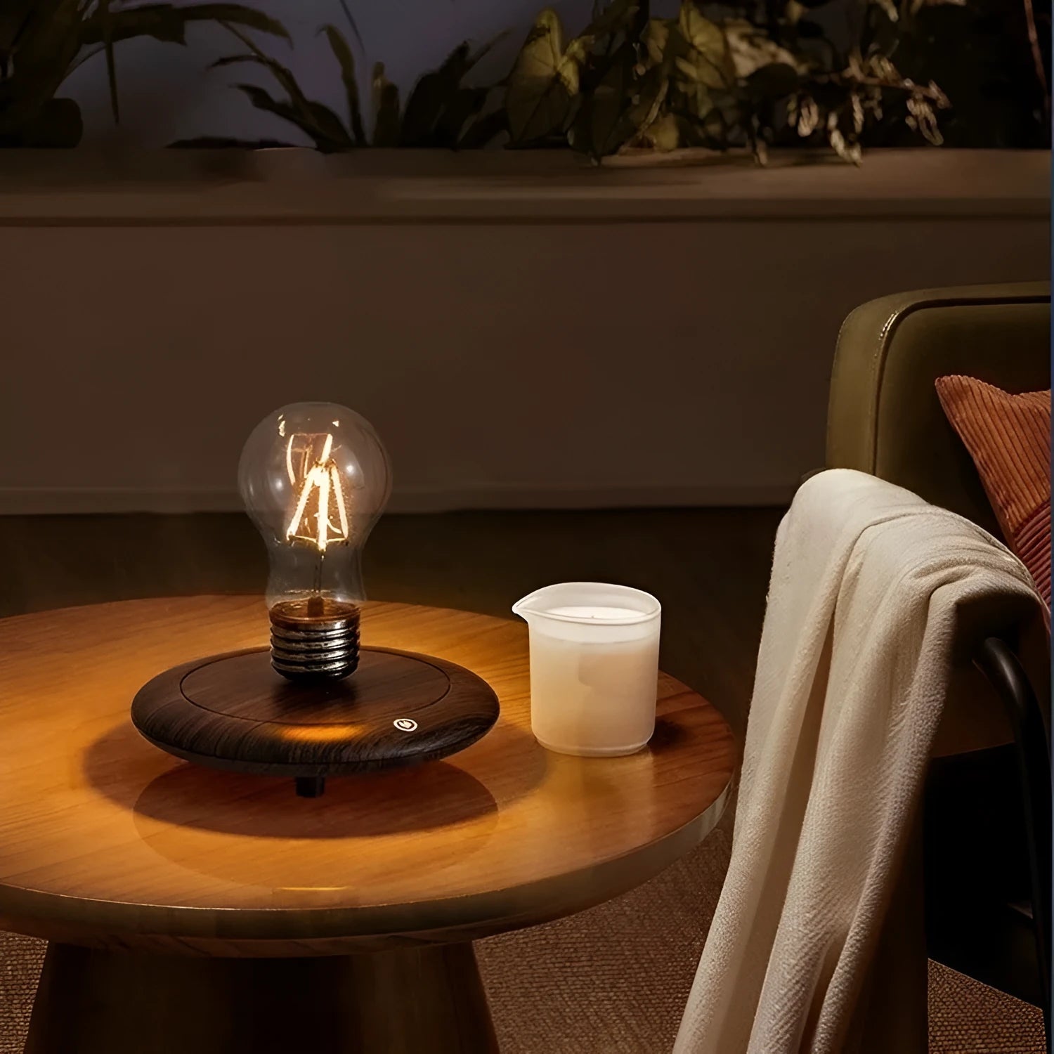 Iron art suspension bulb desktop night lamp on a black square base.
