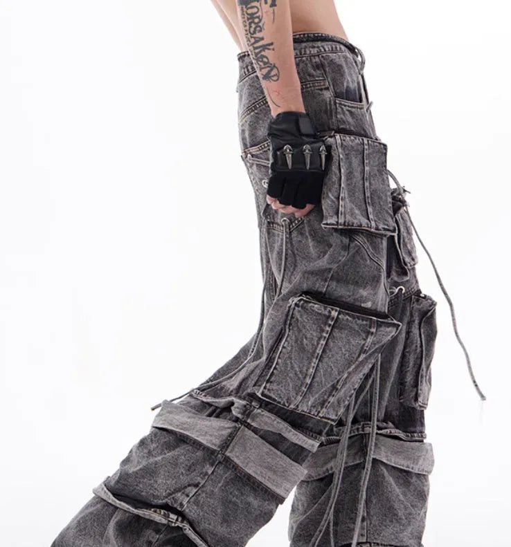 Grey denim distressed overalls with rope stitching and mop pants design
