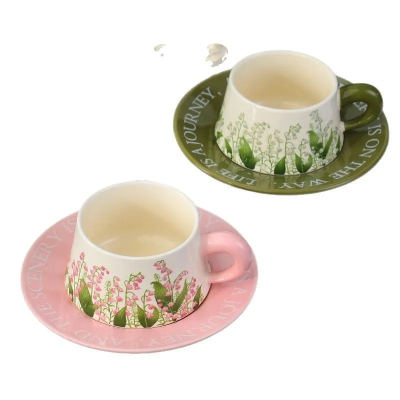 Ceramic coffee cup set with two 300ml cups, matching saucers, and stirring spoons