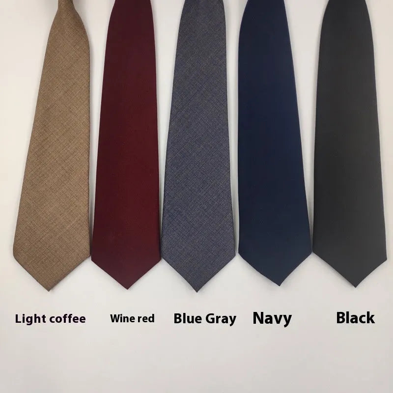 Men's solid navy blue cotton bow tie showing arrow-type design and dimensions