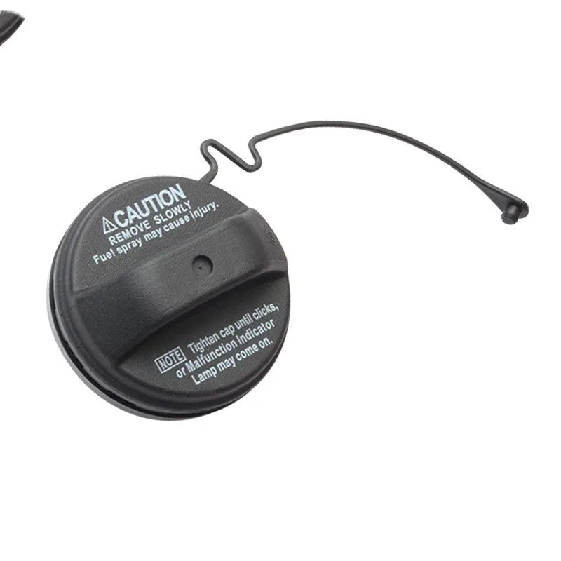 Black snap-on fuel tank cap for Toyota vehicle replacement.