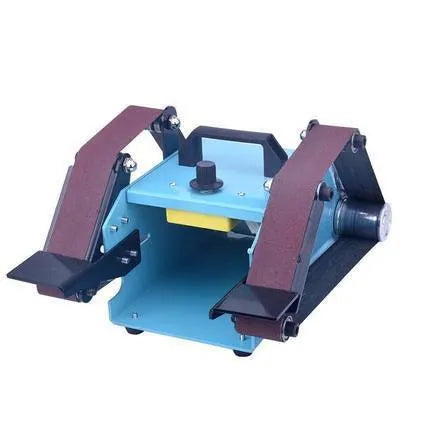 Blue desktop dual-axis belt sander with variable speed switch on a workbench.