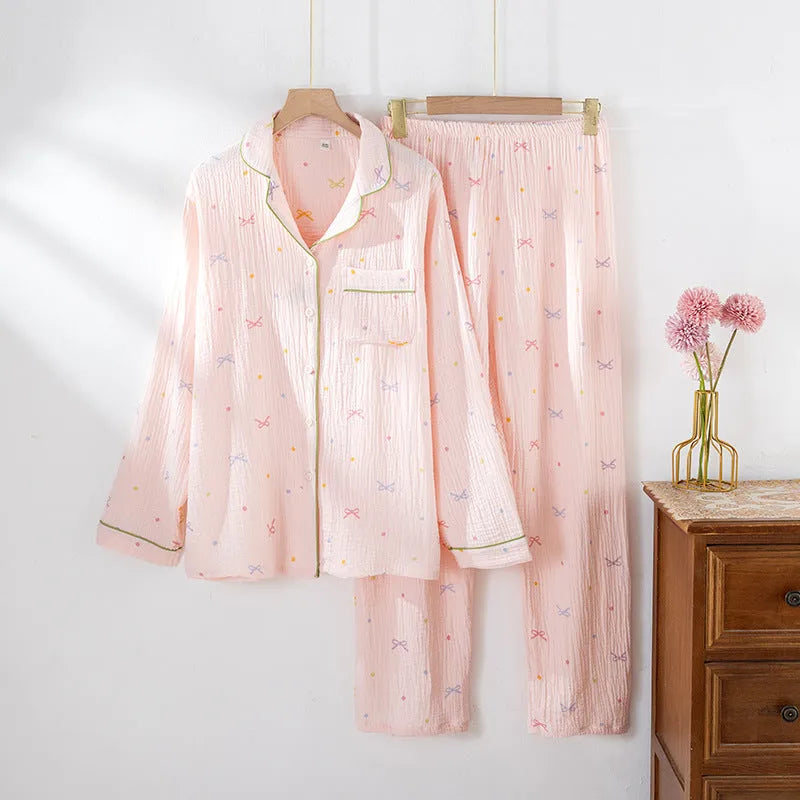 Women's pink cotton pajamas set with long sleeves and trousers, thin fabric for warm weather