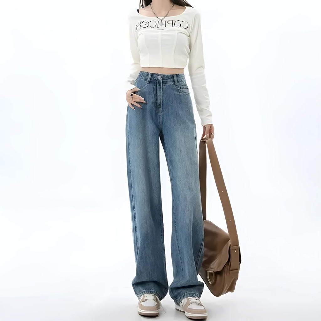 Women's retro blue high-waist wide-leg denim trousers on a hanger, showing straight leg cut.
