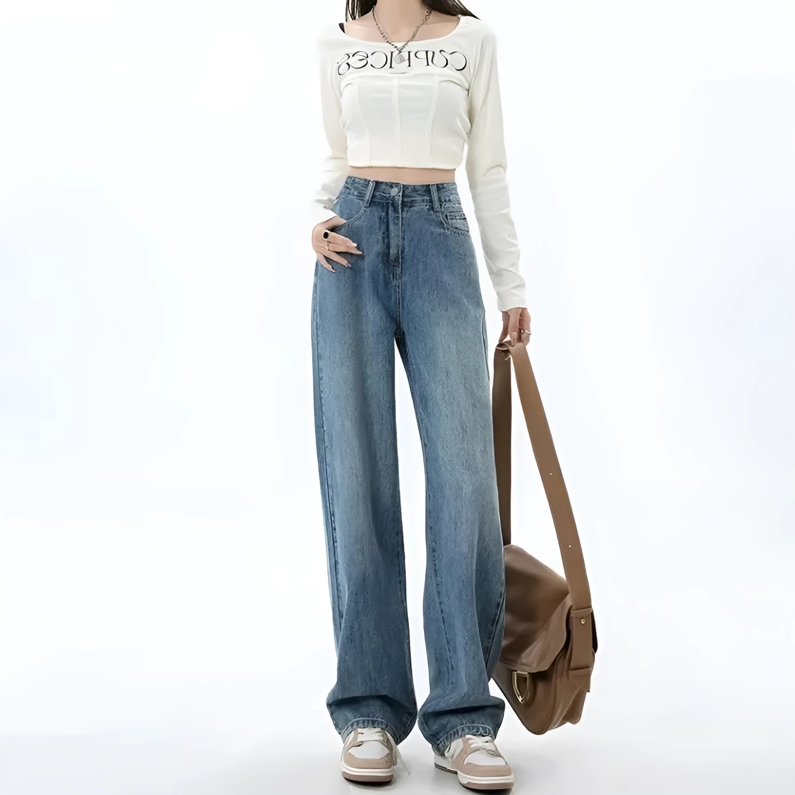 Women's retro blue high-waist wide-leg denim trousers on a hanger, showing straight leg cut.