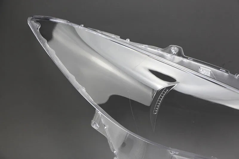 Mazda 3 Exela replacement headlamp cover with snake glue adhesive tube.