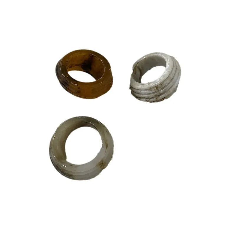 Chinese-style irregular geometric resin ring in brown and white colour options