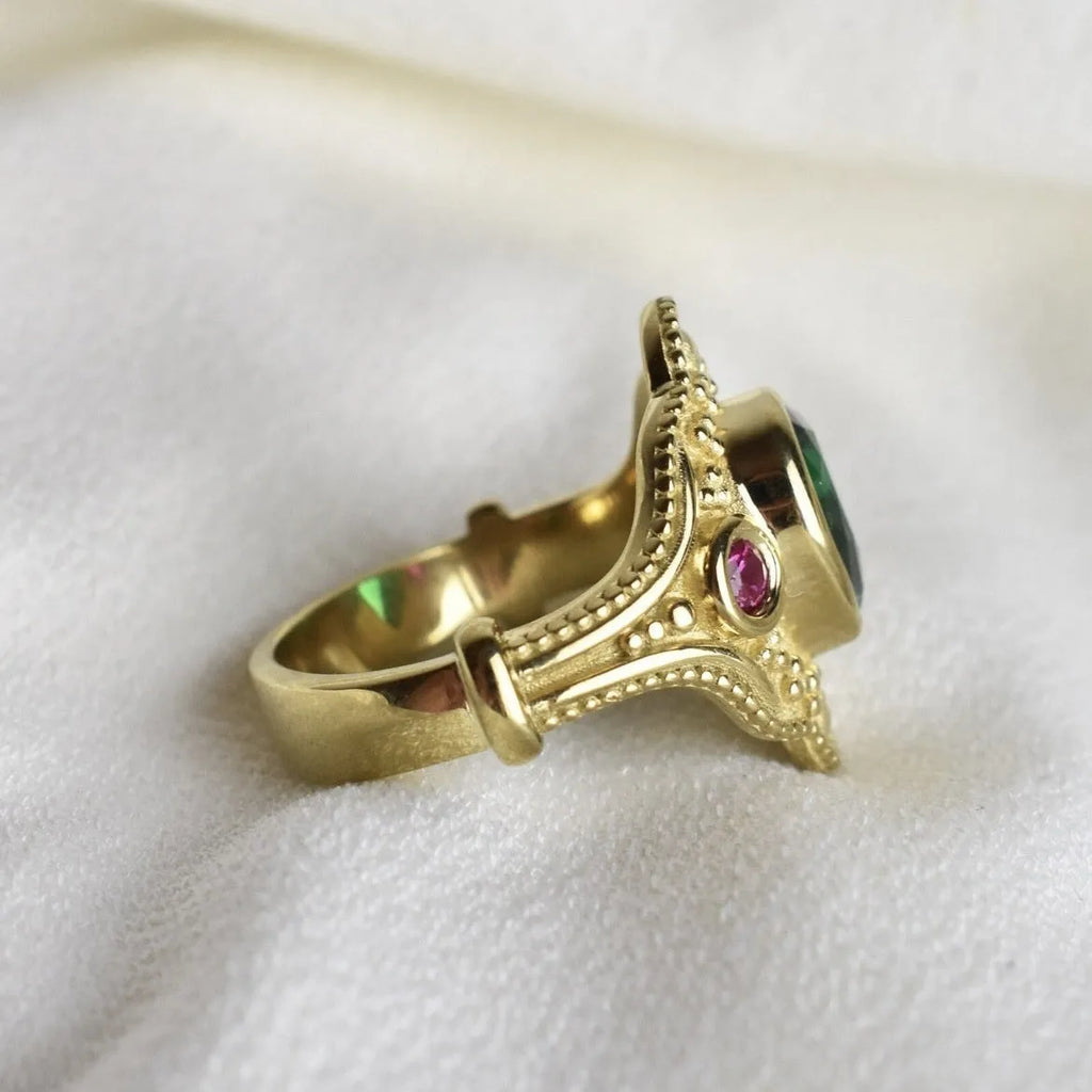 Geometric gold-plated women's ring on a white background, showing its alloy construction and lvzuan colour.