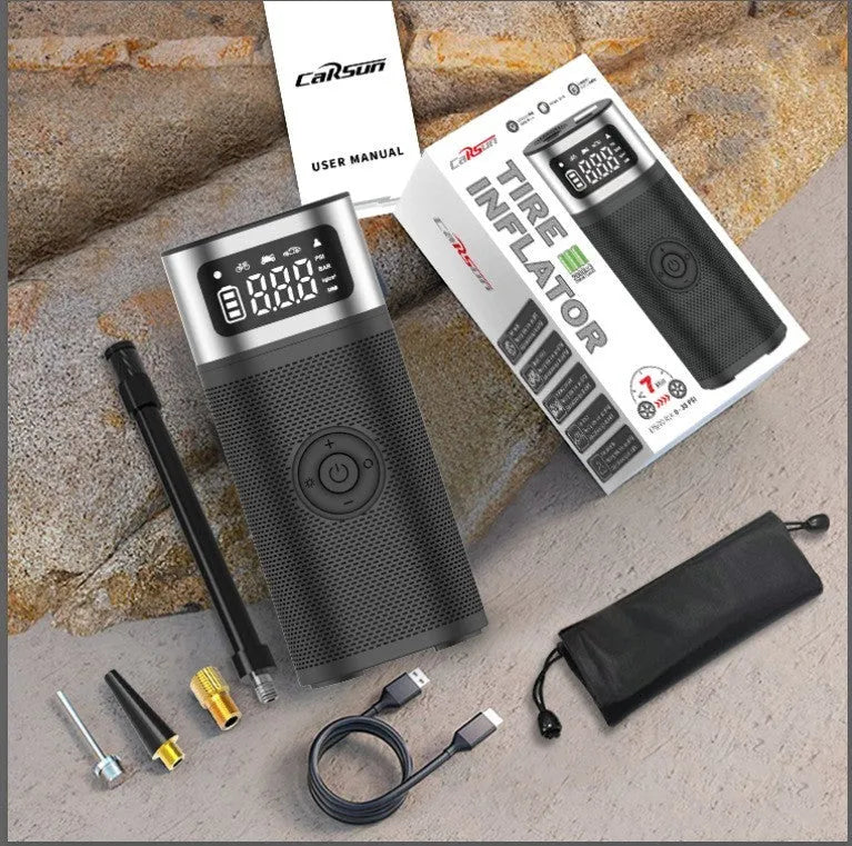 Black portable wireless vehicle air pump with metal construction and 15cm inflation tube including multiple nozzle attachments