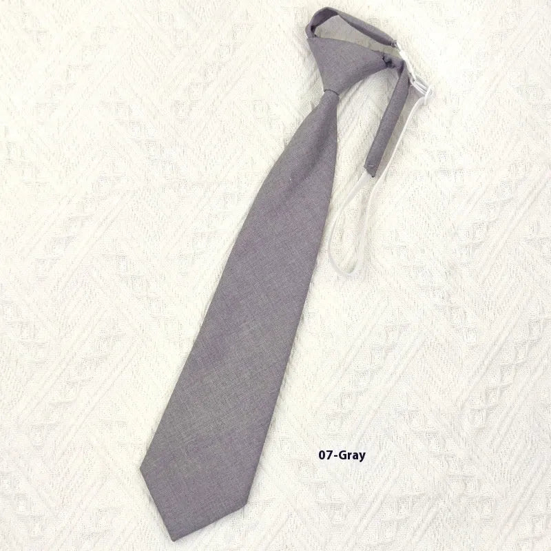 Men's solid colour cotton arrow style bow tie in navy blue.