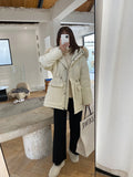Women's cream white high-waisted wide-leg knitted trousers with a straight leg and drooping hem.