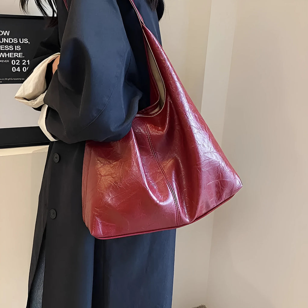 Soft PU leather casual shoulder bag with sandwich pocket in multiple colour options.