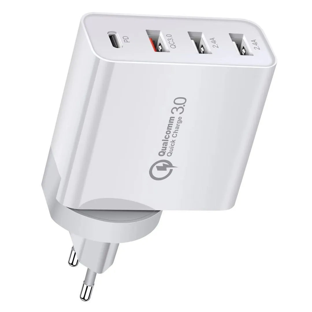 A white or black multi-port USB fast charger with PD and QC ports on a table.