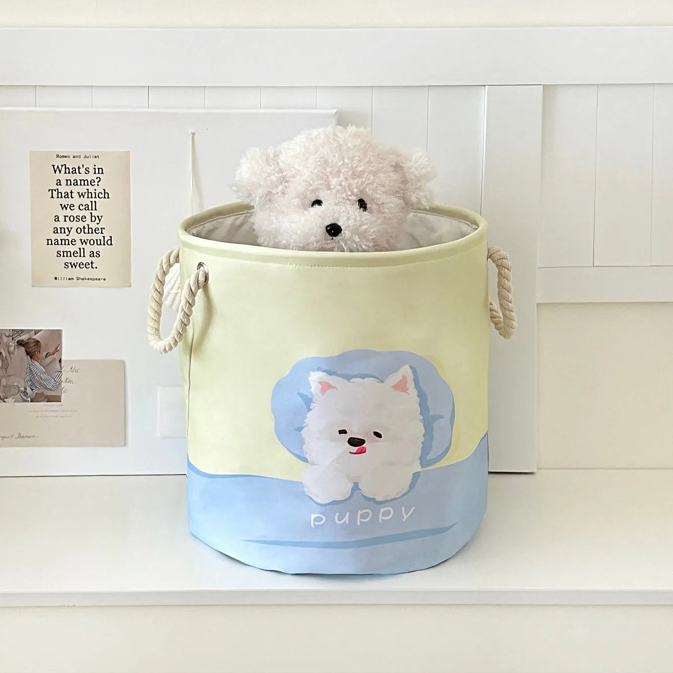 Foldable cotton cloth laundry basket in a character print colour, shown unfolded for use.
