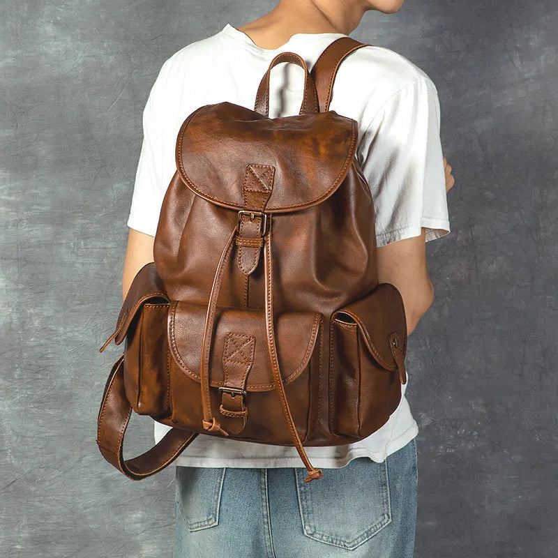Genuine leather retro backpack for men in light brown with geometric pattern and contrast stitching