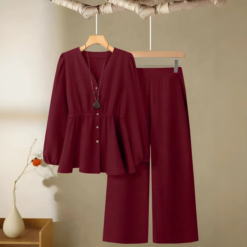 Women's woven polyester two-piece suit in wine red with button-front long-sleeved top and matching full-length trousers
