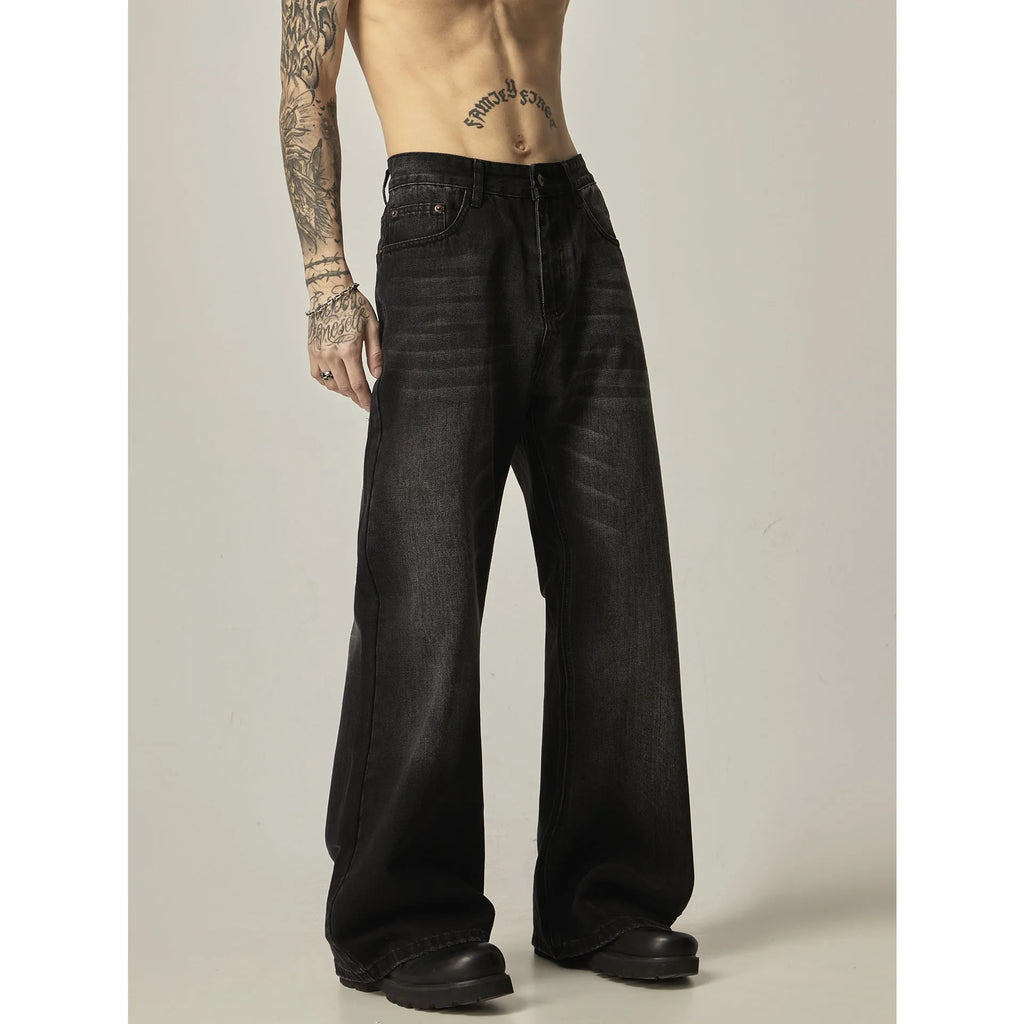 Man's black loose-fit straight-leg retro jeans made from polyester denim fabric.