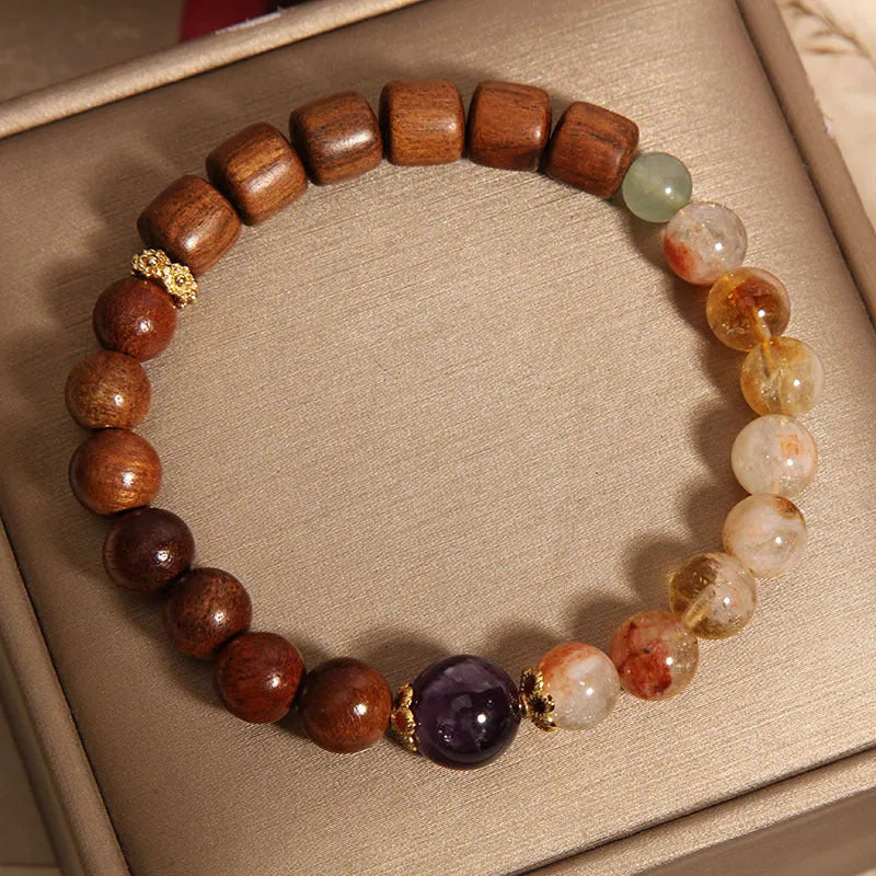 Yellow tower crystal and ebony amethyst women's bracelet with rhinestone details.