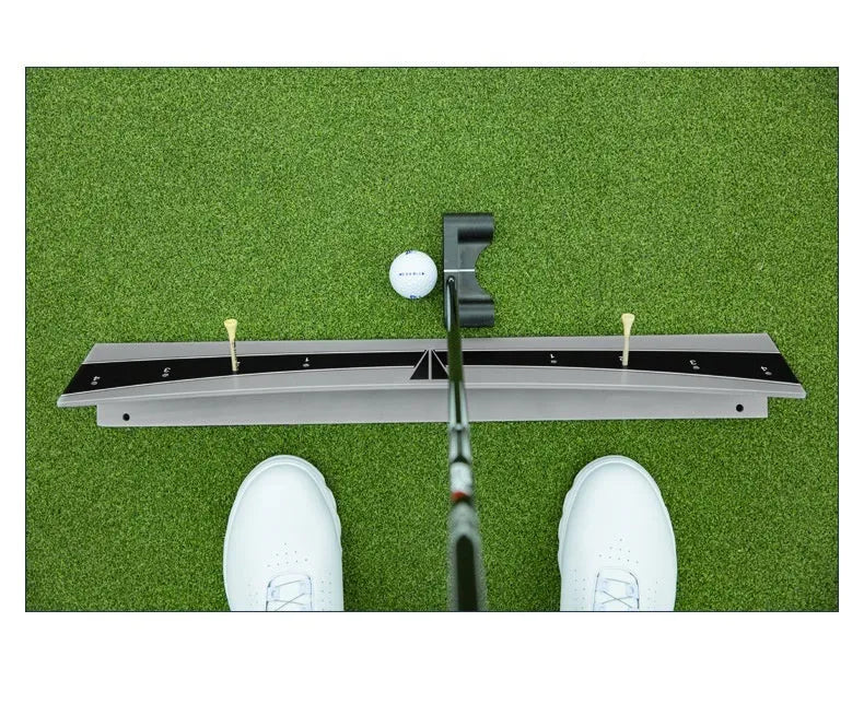 Golf putter trajectory balance simulator with adjustable PVC push rod on a green carpet