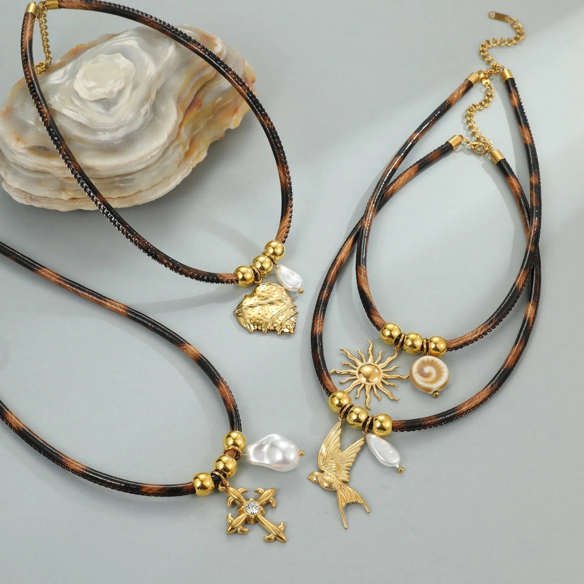 Geometric leopard pendant necklace on adjustable chain with 18K gold electroplated finish