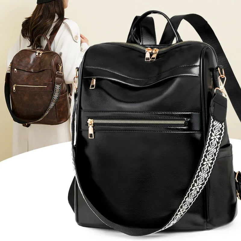 Retro PU backpack in black with multiple compartments, waterproof and wear-resistant, for daily use.