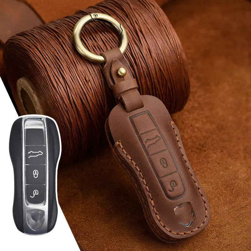 Genuine cowhide leather Porsche key cover with retro bag buckle in blue and brown colour options